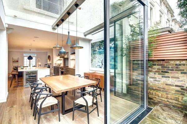 Victorian terraced house with open plan living room/ dining room and kitchen diner with concertina doors opening up onto the garden