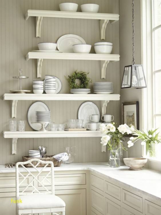 Small Simple Country Kitchen Design With Red Wallpaper And Antique Chandelier Over Freestanding Kitchen Island