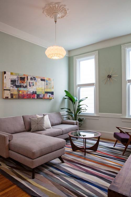 Clever blue accents enliven the yellow dining room [Design: Charmean Neithart Interiors]