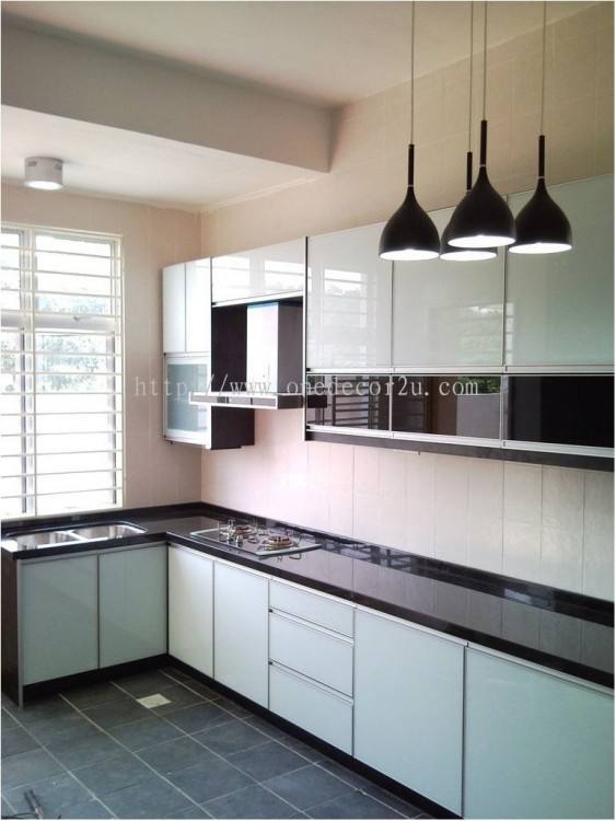 Red gloss laminate kitchen with white counter by Zone One Kitchen Solutions