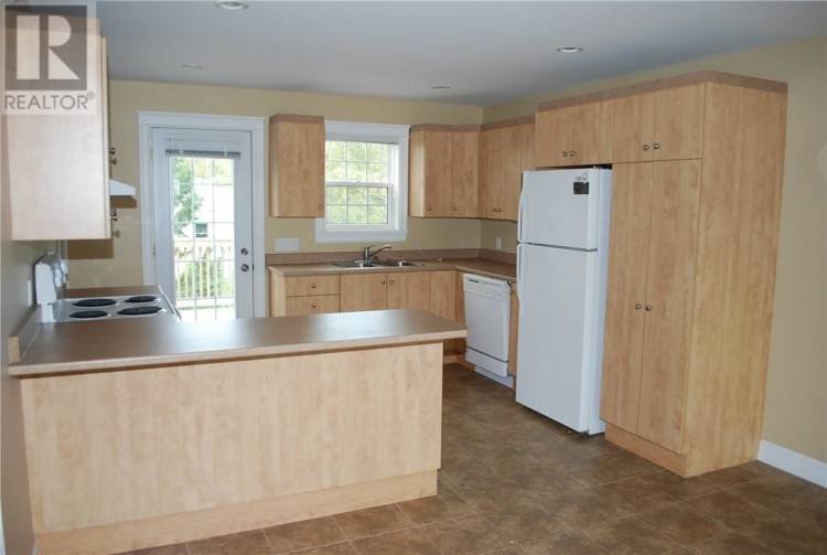 shaker style larder cupboard walnut shaker in stock kitchens furniture surplus moncton