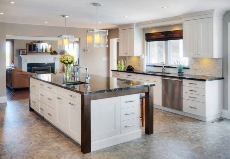 Transitional kitchen with pendant light and round glass table