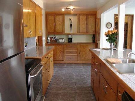 Kitchen with black stainless appliances