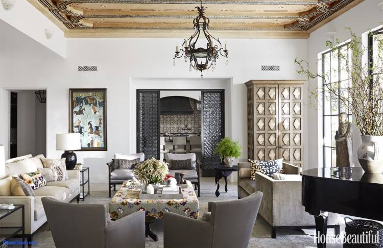 Grey and yellow dining room with a fabulous chandelier