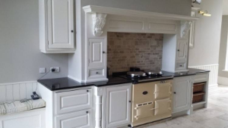 Painted white kitchen cabinets by Aristokraft Cabinetry