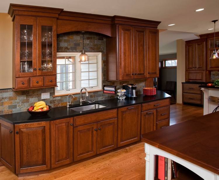 The kitchen features tiles flooring and wide space