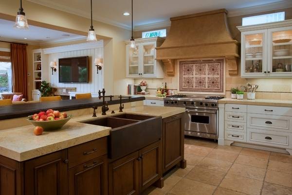 Fabulous kitchen with custom copper and stainless steel La Cornue range [Design: Artichoke]