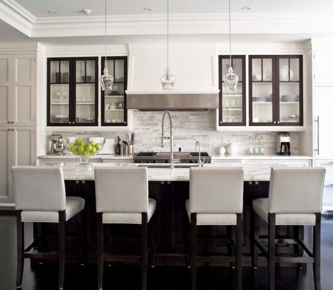 Island Range Hood With Wooden Cabinet White Granite Countertop Under  Recessed Lights In Modern Kitchen