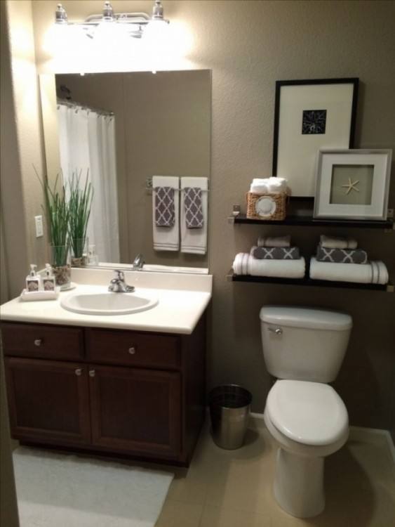 Recycled wood creates a beautiful textured wall element for half bathroom