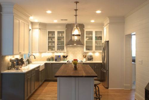 Not to worry, the 8′ ceiling can remain as is and still look great! The below example has 36″ tall upper cabinets and crown molding installed right up to an