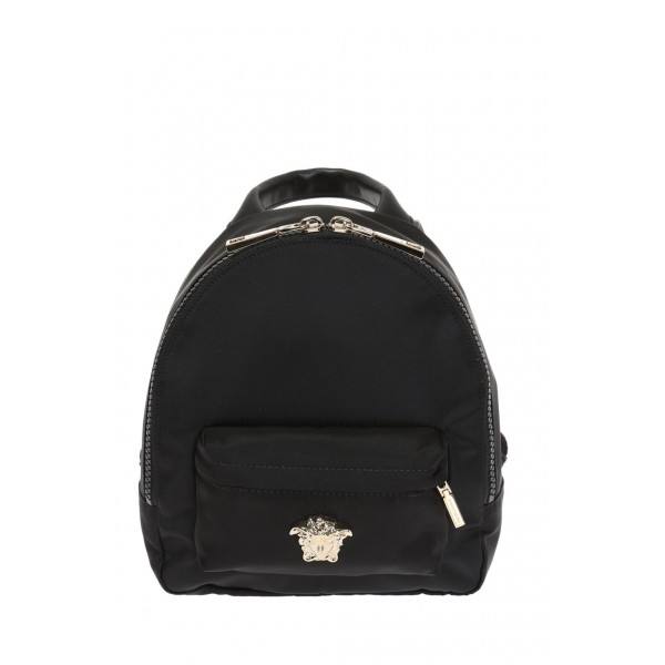 Designed for the active woman leaping into a busy day, this Versace backpack showcases a spacious interior that can fit everything from your laptop to your
