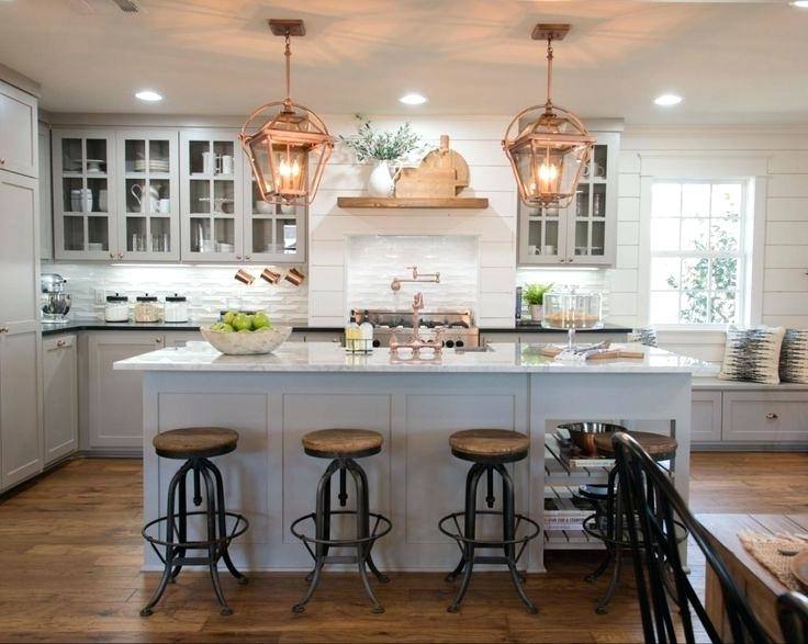 We used last week to sand, prime, and paint all of our upper kitchen cabinets and – shocker – we ended up going with white