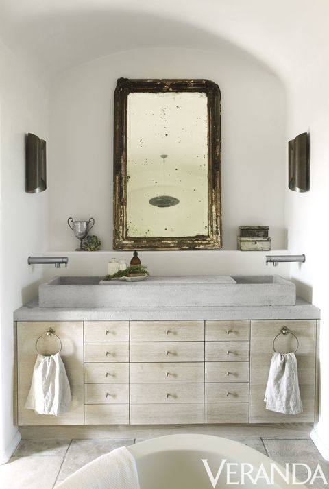 I like that the shower is open, and that the floor tile extends all the way up the back shower wall