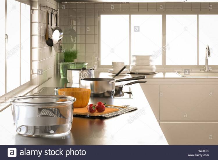 Opened kitchen drawer with plates inside, a smart solution for kitchen storage and organizing