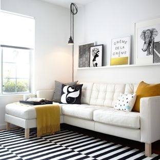 Scandinavian master bedroom with hardwood floor and pendant light