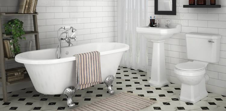 Retro flooring, metro tiles and a high level cistern give this bathroom a beautiful traditional look
