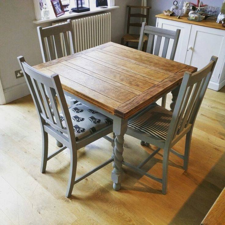 Dining table painted white with blue stripes