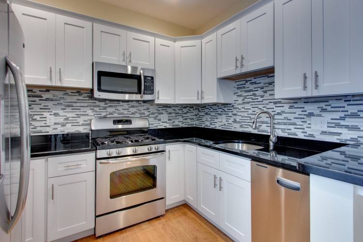 White inset kitchen cabinets by Decora Cabinetry